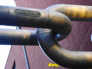 Illustration for article titled The Never-Bust Chain Links Two Historic Buildings in Art